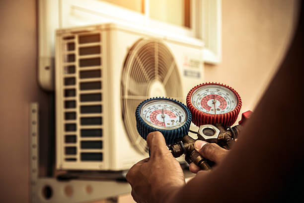 Professional Air Conditioning Service technician working in Creola, OH